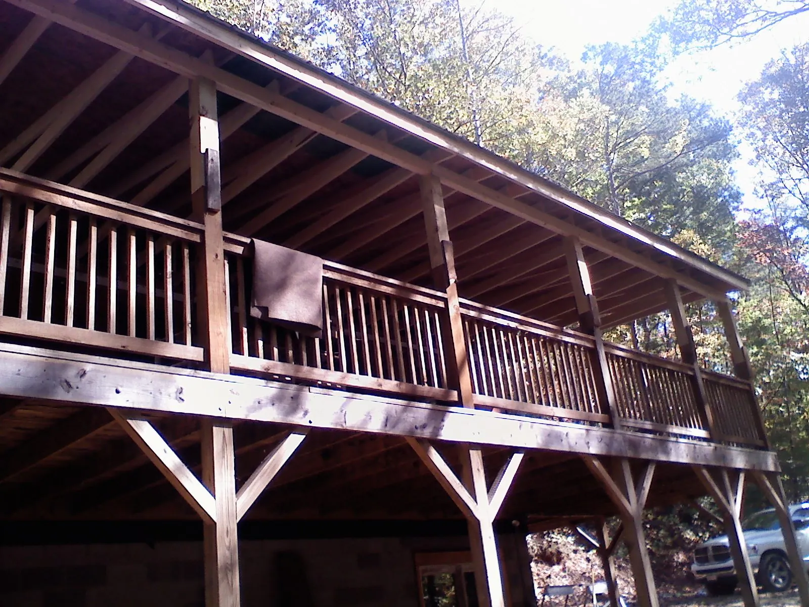 Timber framing under a new elevated porch and deck — Roof Leak Repair in Gray by Roofing Brothers